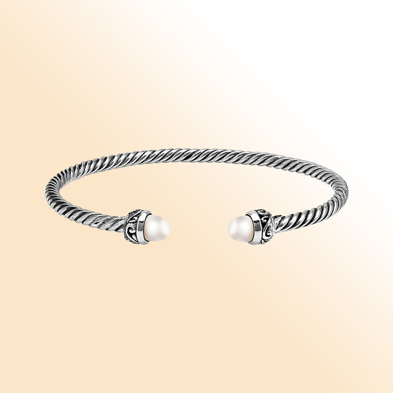 Sterling Silver Twisted Bangle With Pearl End Caps