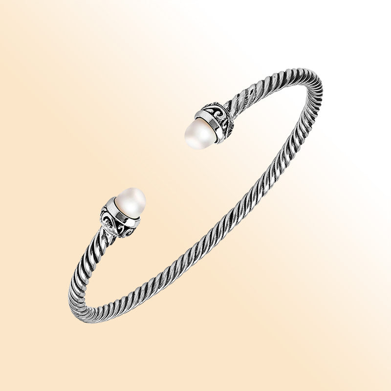 Sterling Silver Twisted Bangle With Pearl End Caps