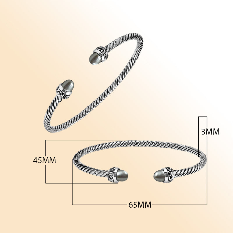 Handcrafted Sterling Silver Twisted Cable Bangle With Gray Mabe Pearls and Oxidized Tribal Detailing.