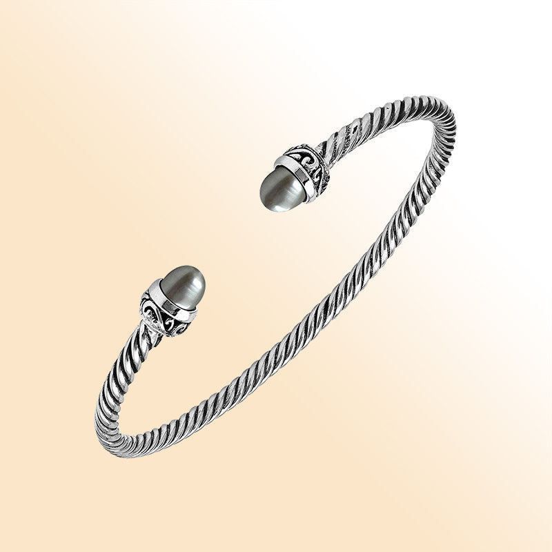 Handcrafted Sterling Silver Twisted Cable Bangle With Gray Mabe Pearls and Oxidized Tribal Detailing.