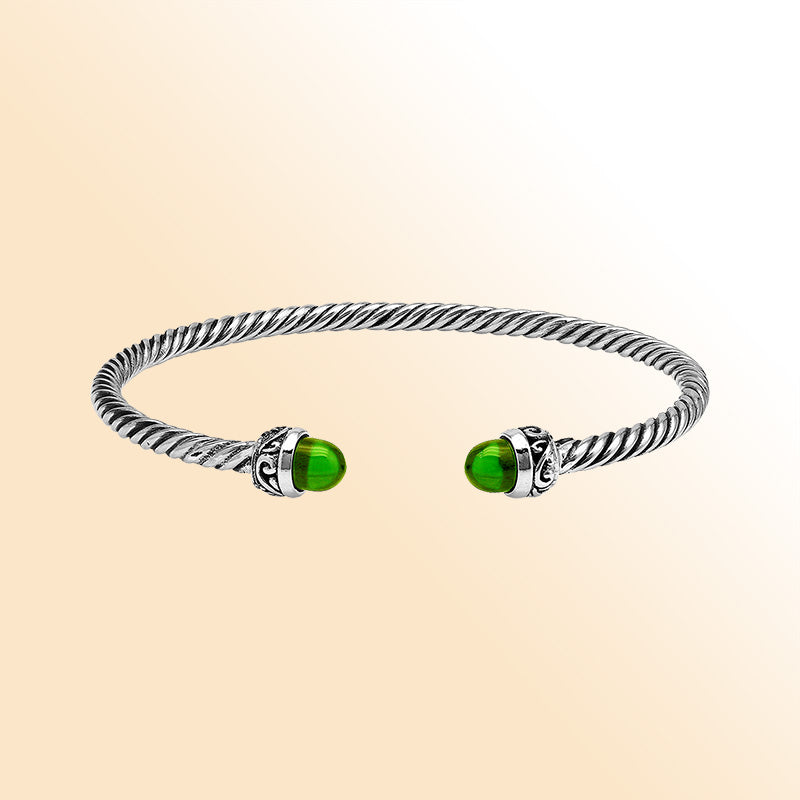 Handcrafted Sterling Silver Twisted Cable Bangle With Green Peridot Quartz and Oxidized Balinese Carvings.