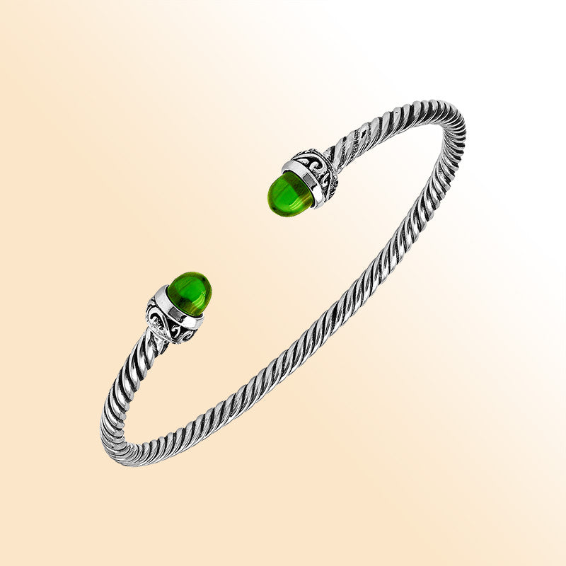 Handcrafted Sterling Silver Twisted Cable Bangle With Green Peridot Quartz and Oxidized Balinese Carvings.