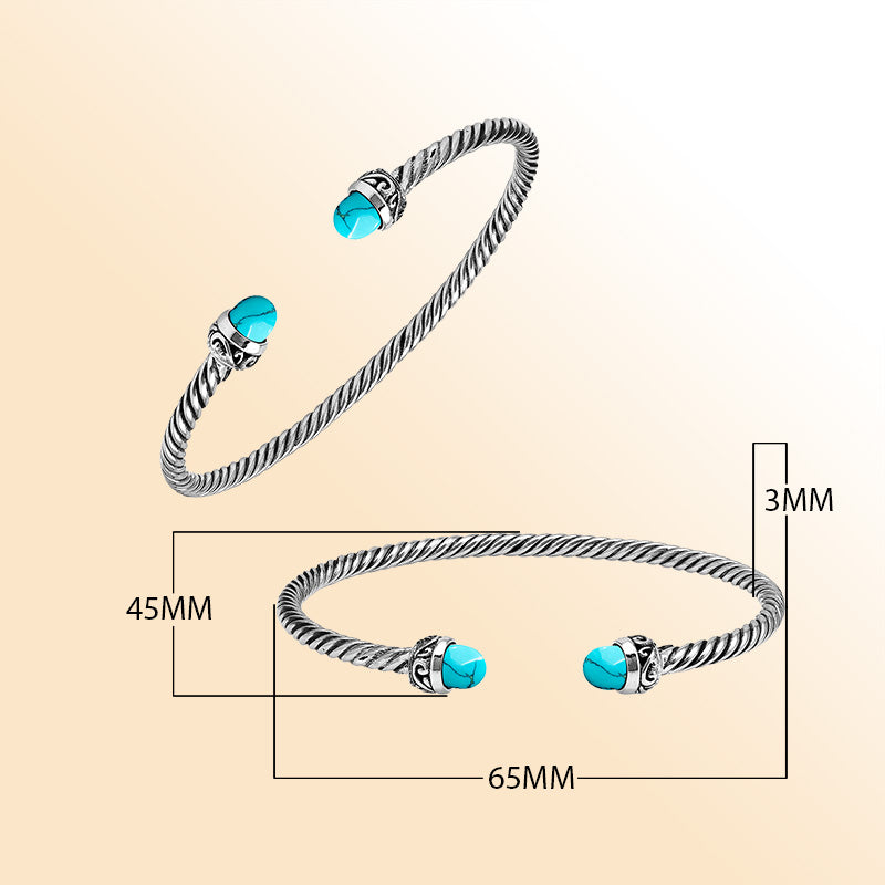 Handcrafted Sterling Silver Twisted Cable Bangle With Turquoise Shell and Oxidized Balinese Carvings.