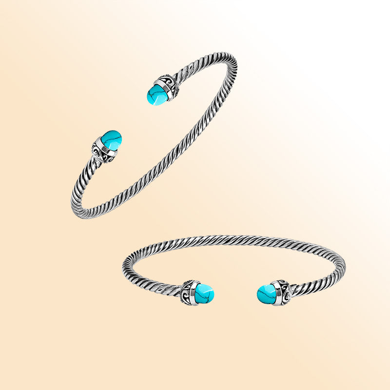 Handcrafted Sterling Silver Twisted Cable Bangle With Turquoise Shell and Oxidized Balinese Carvings.