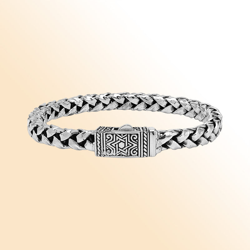 Sterling silver flat Bali weave heritage bracelet with geometric clasp handcrafted in Bali, Indonesia.