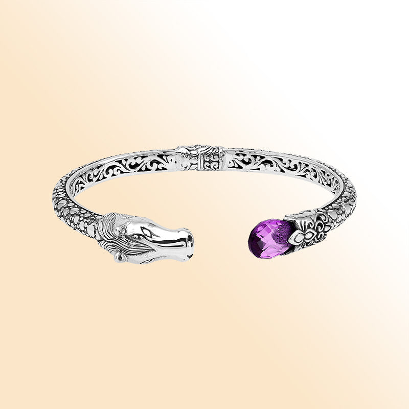 Handcrafted sterling silver dragon head bangle with Amethyst Quartz from Bali, featuring intricate filigree design and antique finish.