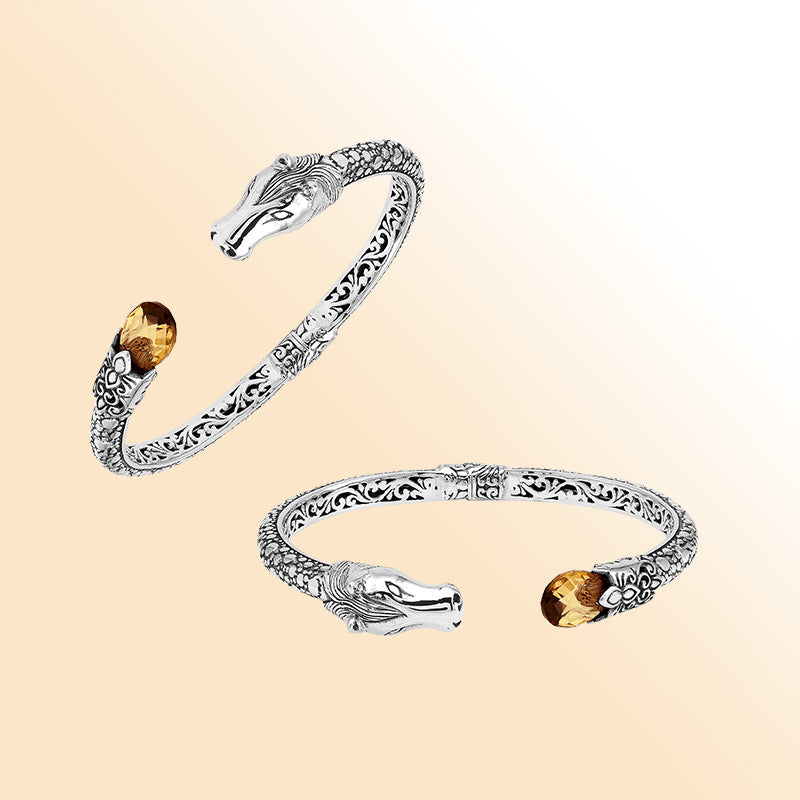 Handcrafted sterling silver dragon head bangle with Citrine Quartz from Bali featuring detailed filigree and antique silver finish.