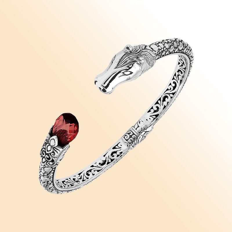 Handcrafted sterling silver dragon head bangle with Garnet Quartz from Bali featuring detailed filigree and antique finish.