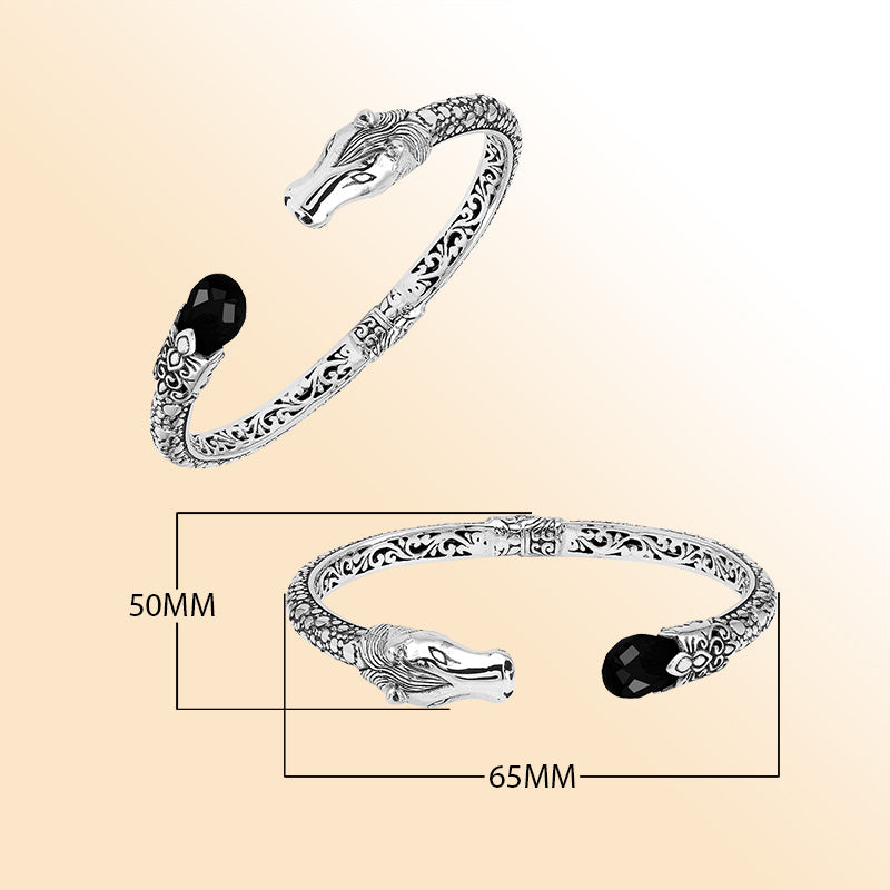 Handcrafted sterling silver dragon head bangle with Black Onyx from Bali featuring detailed filigree and antique finish.