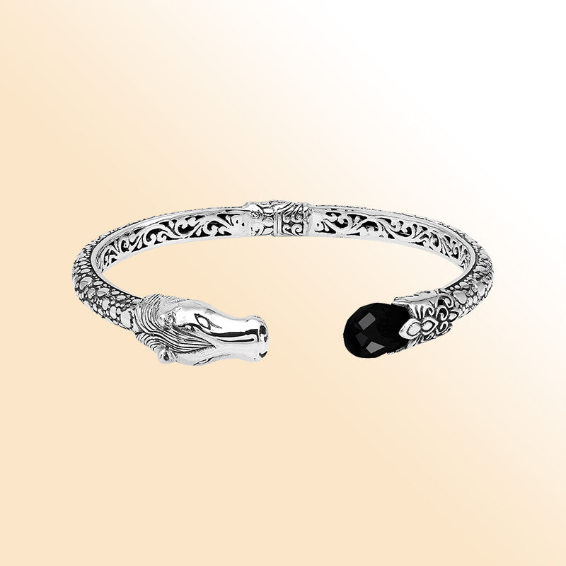 Handcrafted sterling silver dragon head bangle with Black Onyx from Bali featuring detailed filigree and antique finish.