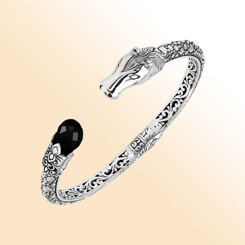 Handcrafted sterling silver dragon head bangle with Black Onyx from Bali featuring detailed filigree and antique finish.
