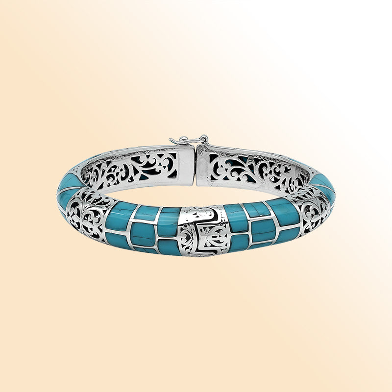 Handcrafted sterling silver turquoise shell inlay hinged bangle with filigree accents made in Bali.