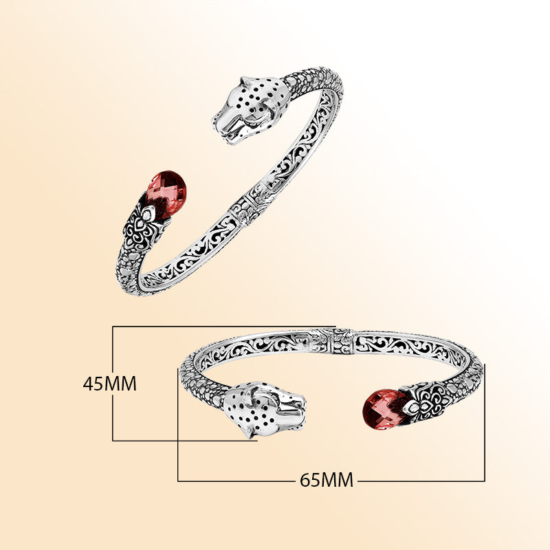 Handcrafted sterling silver cuff with garnet quartz and panther head design made in Bali.