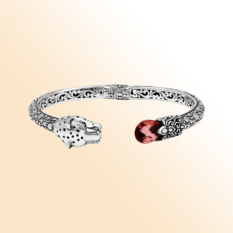 Handcrafted sterling silver cuff with garnet quartz and panther head design made in Bali.