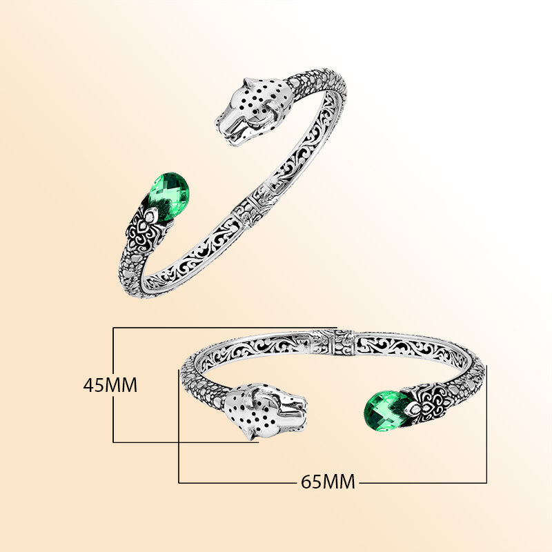 Handcrafted sterling silver cuff with green quartz and panther head design made in Bali.