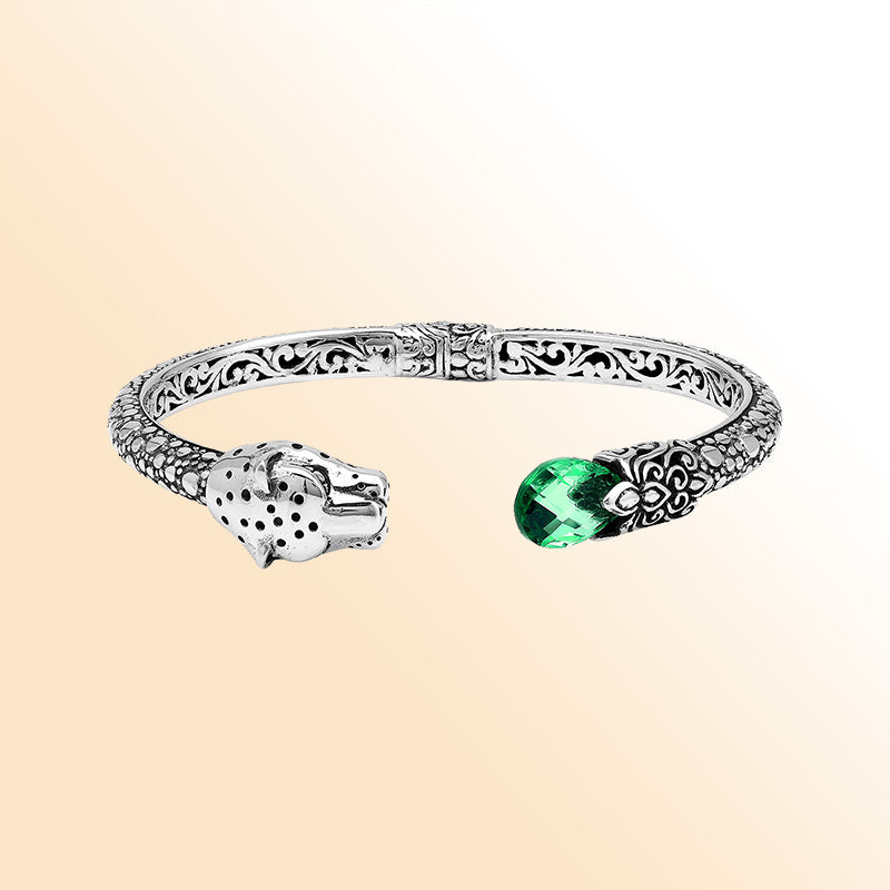 Handcrafted sterling silver cuff with green quartz and panther head design made in Bali.