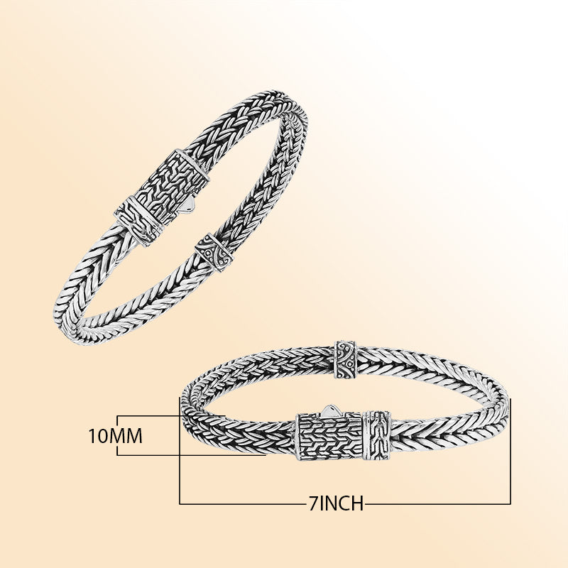 Elegant sterling silver woven chain bracelet with artistic detailing and secure push clasp, polished to perfection for modern everyday style and timeless sophistication.