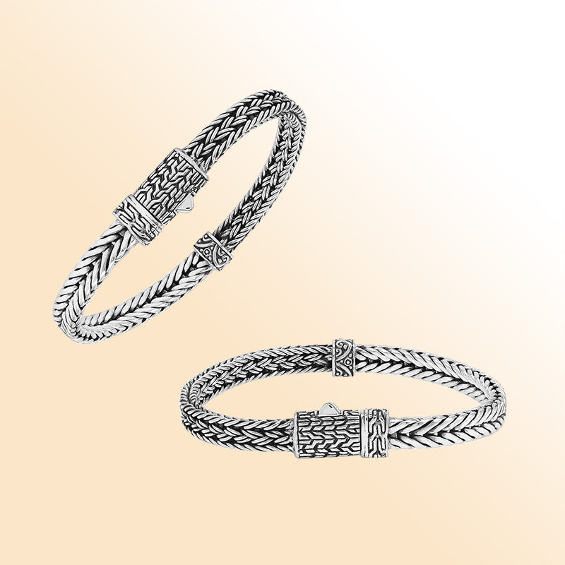 Elegant sterling silver woven chain bracelet with artistic detailing and secure push clasp, polished to perfection for modern everyday style and timeless sophistication.