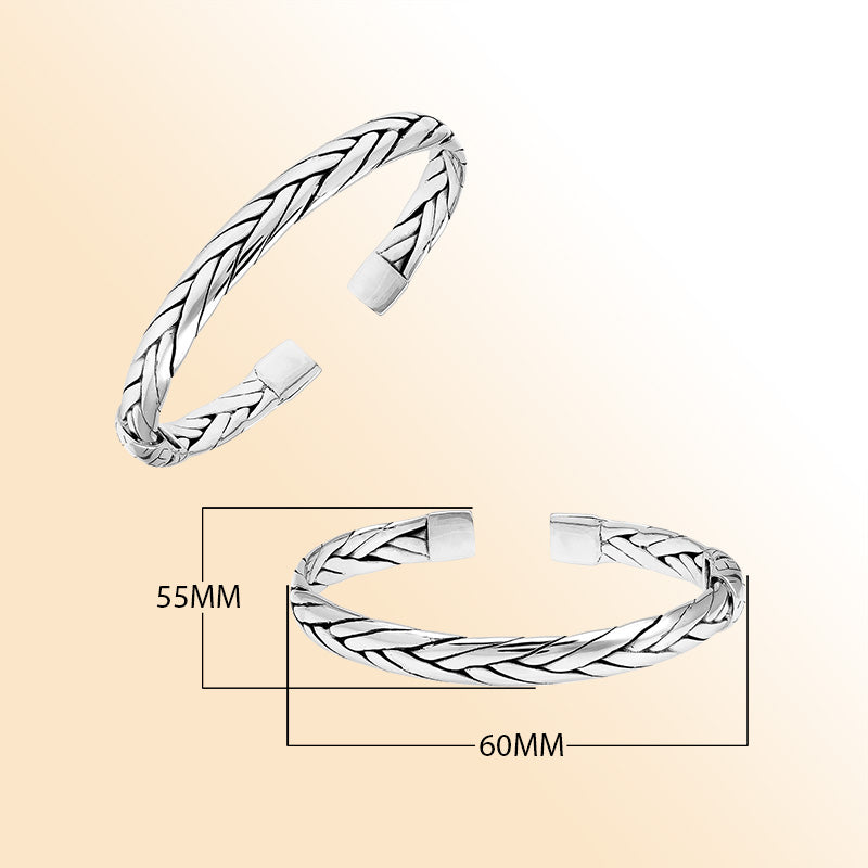 A handcrafted sterling silver small bangle featuring woven Balinese textures, polished finishing, and a strong hinge lock designed for stylish everyday wear.