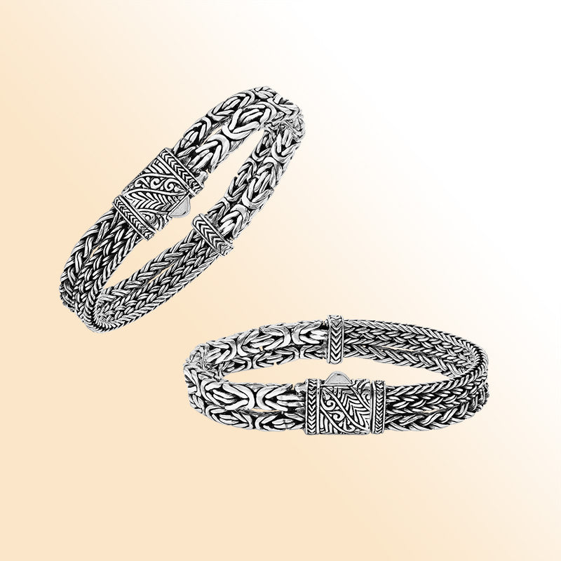 A handcrafted sterling silver woven bracelet featuring polished Balinese textures, sleek detailing, and a secure push clasp, designed for elegant everyday or statement jewelry styling.