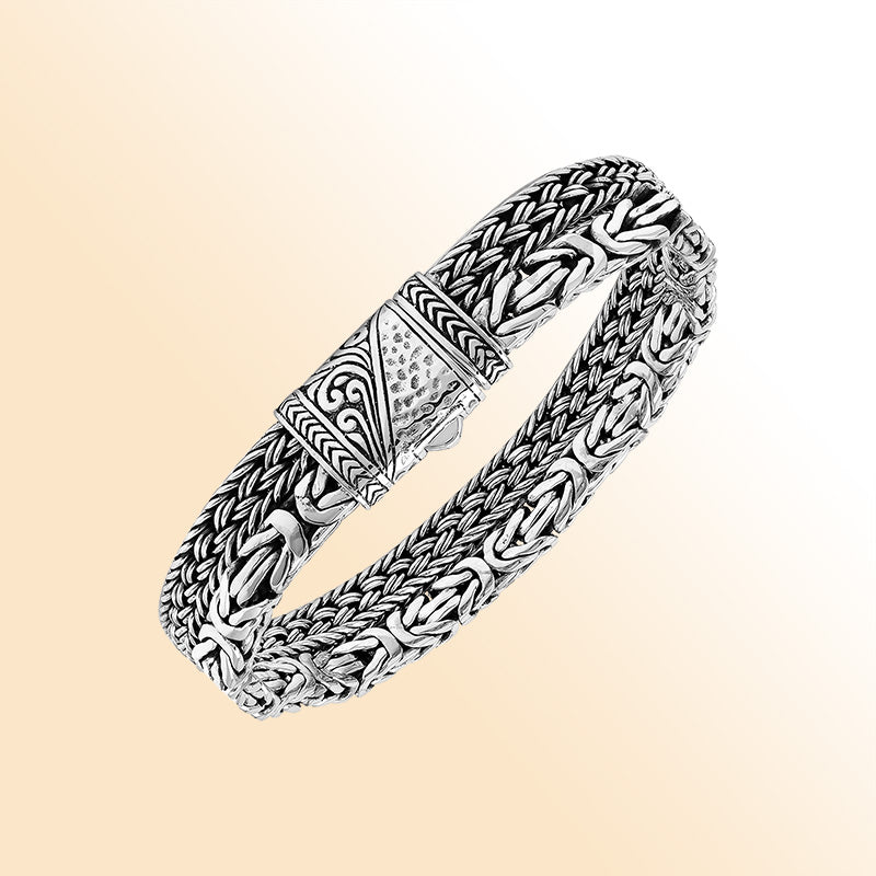 Handcrafted sterling silver woven bracelet featuring detailed Bali patterns and a secure push lock clasp, designed for stylish everyday wear and gifting.