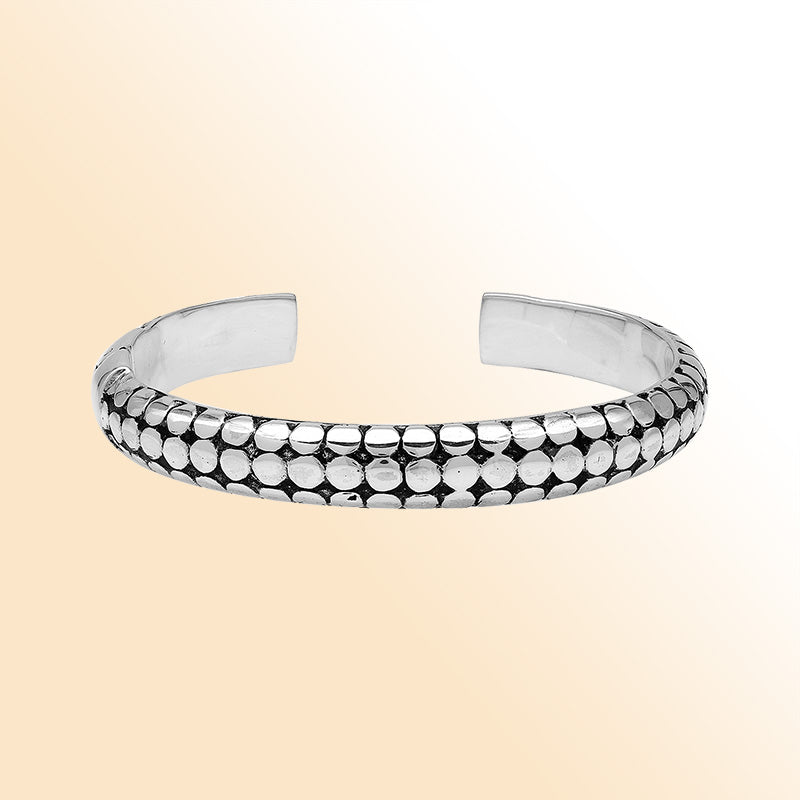 Handcrafted sterling silver medium bangle with polished dot pattern design, oxidized detailing, and a secure hinge lock for comfortable and stylish daily wear.