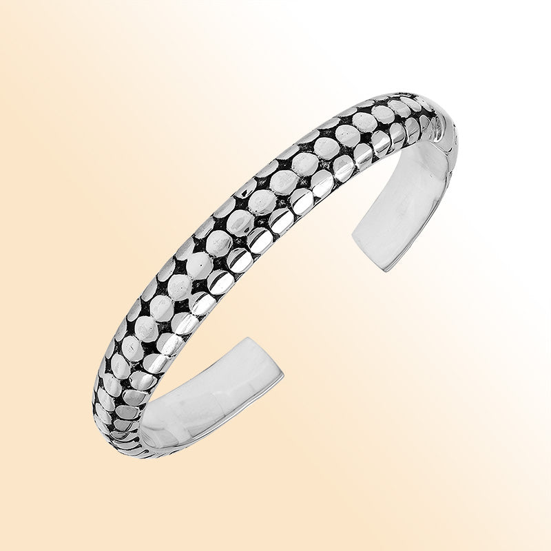 Handcrafted sterling silver medium bangle with polished dot pattern design, oxidized detailing, and a secure hinge lock for comfortable and stylish daily wear.