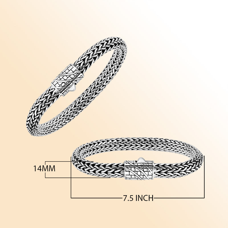 A handcrafted sterling silver wide woven bracelet featuring an engraved push clasp, polished and oxidized detailing, and bold woven styling ideal for modern everyday elegance.