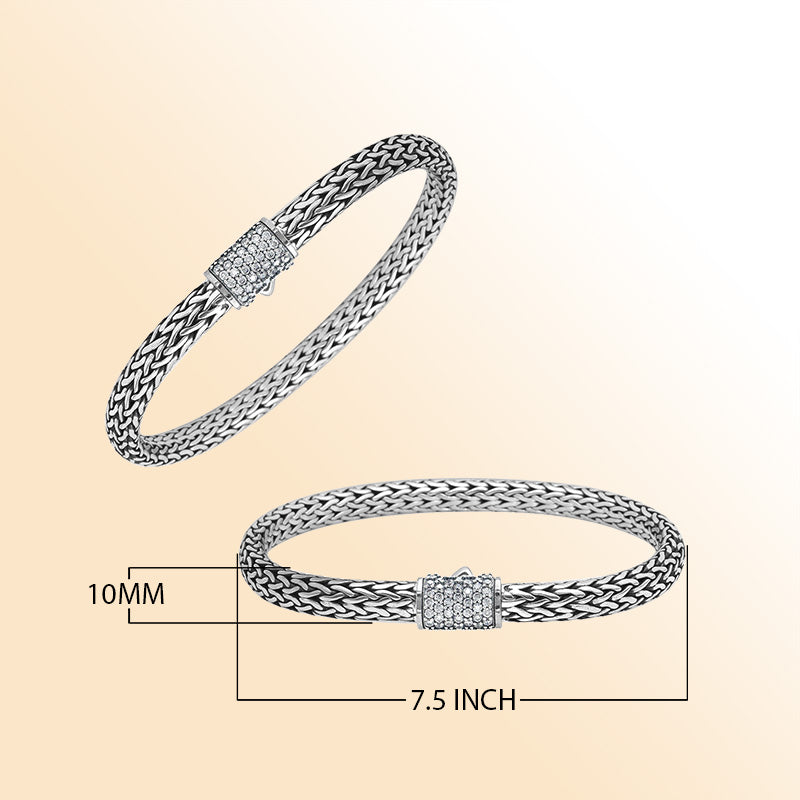 A handcrafted sterling silver elegant woven bracelet featuring a radiant CVD Diamond-studded push clasp, polished–oxidized detailing, and modern luxury styling ideal for everyday wear.