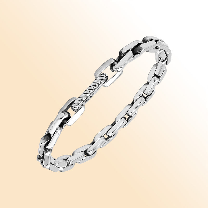 A handcrafted sterling silver polished-link bracelet featuring a secure Carabiner Lock, smooth reflective finishing, and clean modern styling ideal for everyday minimalistic wear.