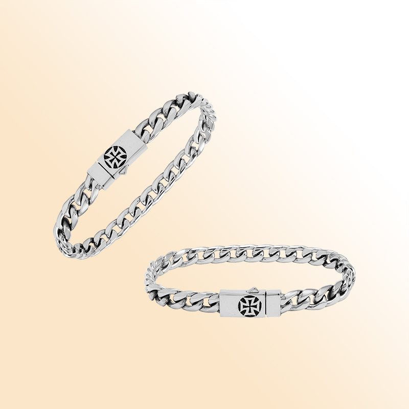 A handcrafted sterling silver polished curb bracelet featuring a detailed engraved Push Clasp, smooth reflective finishing, and contemporary styling for elegant everyday wear.