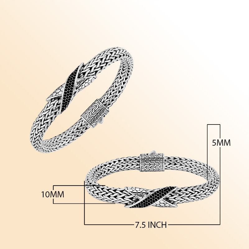 Sterling Silver woven bracelet showcasing an artistic Cubic Zirconia accent with a luminous mirror-polished finish, designed to provide an elegant and expressive accessory with detailed craftsmanship.