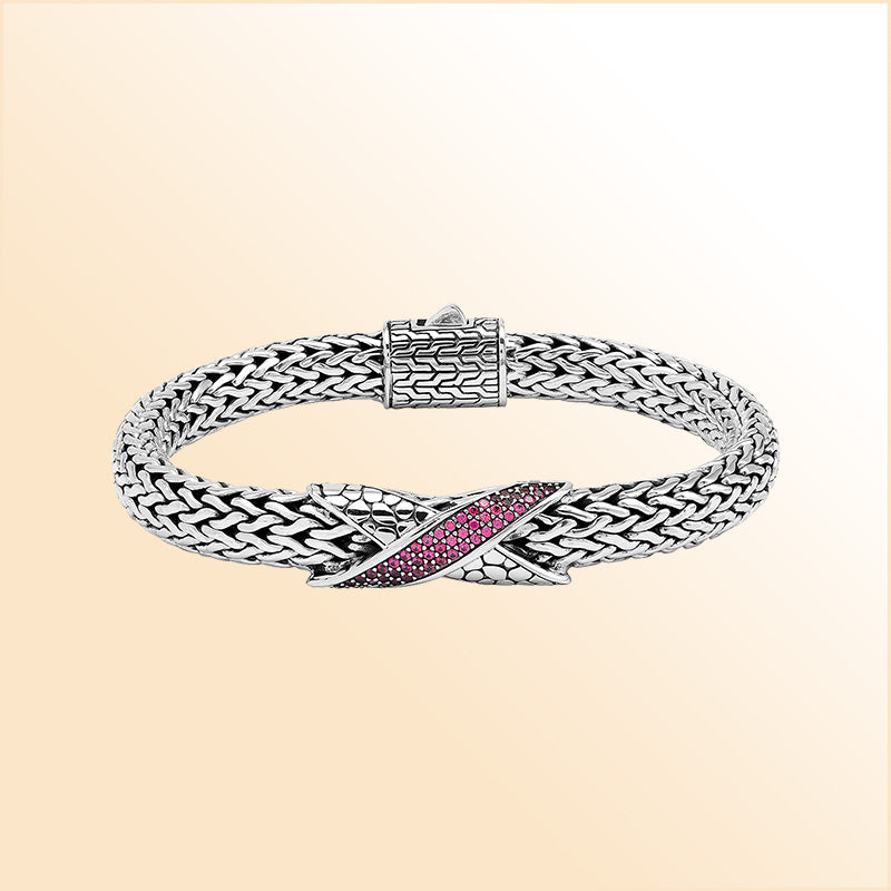 Sterling Silver woven bracelet featuring a vibrant Ruby Quartz crisscross motif with a mirror-polished surface, designed to provide an expressive accessory that blends refined craftsmanship with radiant color.