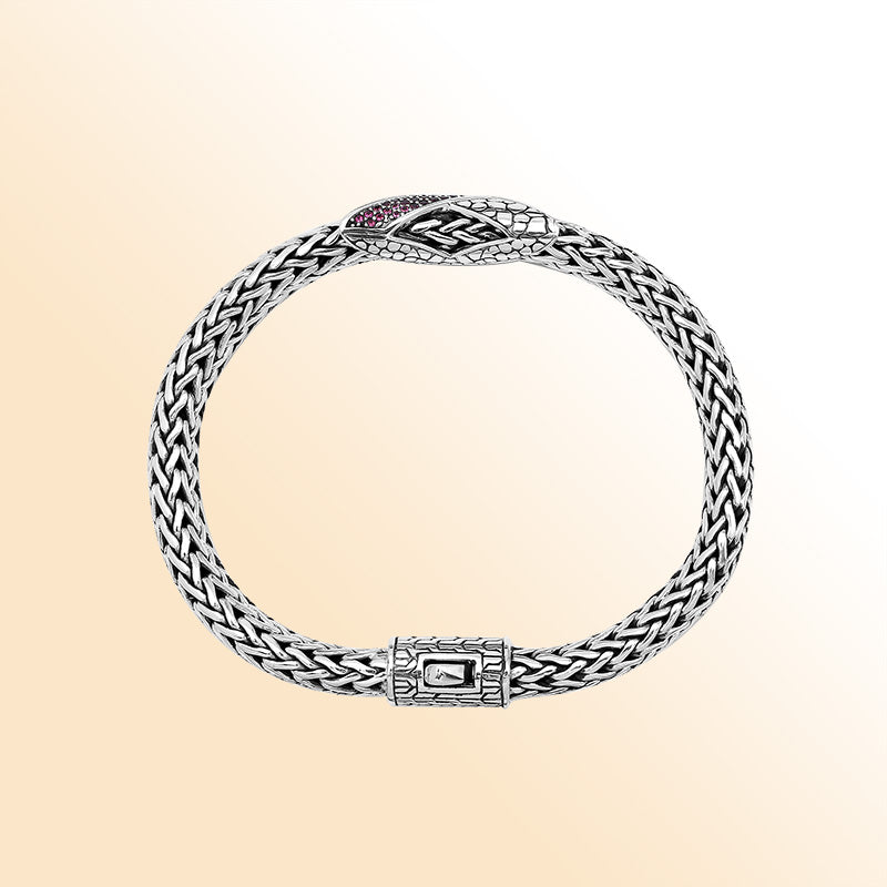 Sterling Silver woven bracelet featuring a vibrant Ruby Quartz crisscross motif with a mirror-polished surface, designed to provide an expressive accessory that blends refined craftsmanship with radiant color.