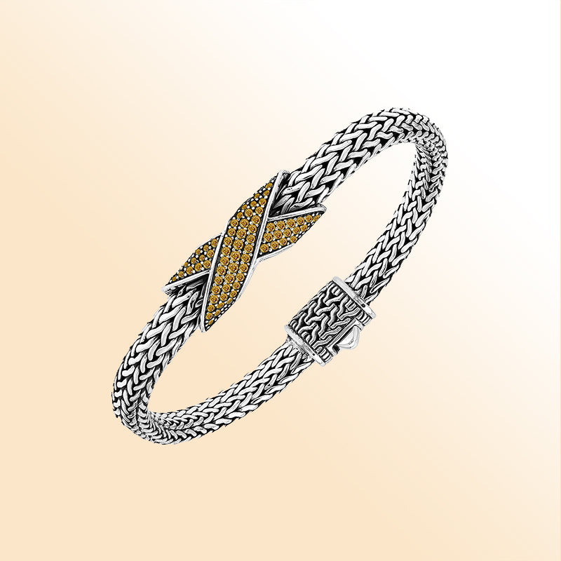  Handcrafted sterling silver woven bracelet featuring a radiant purple Citrine quartz crossover design from Bali.