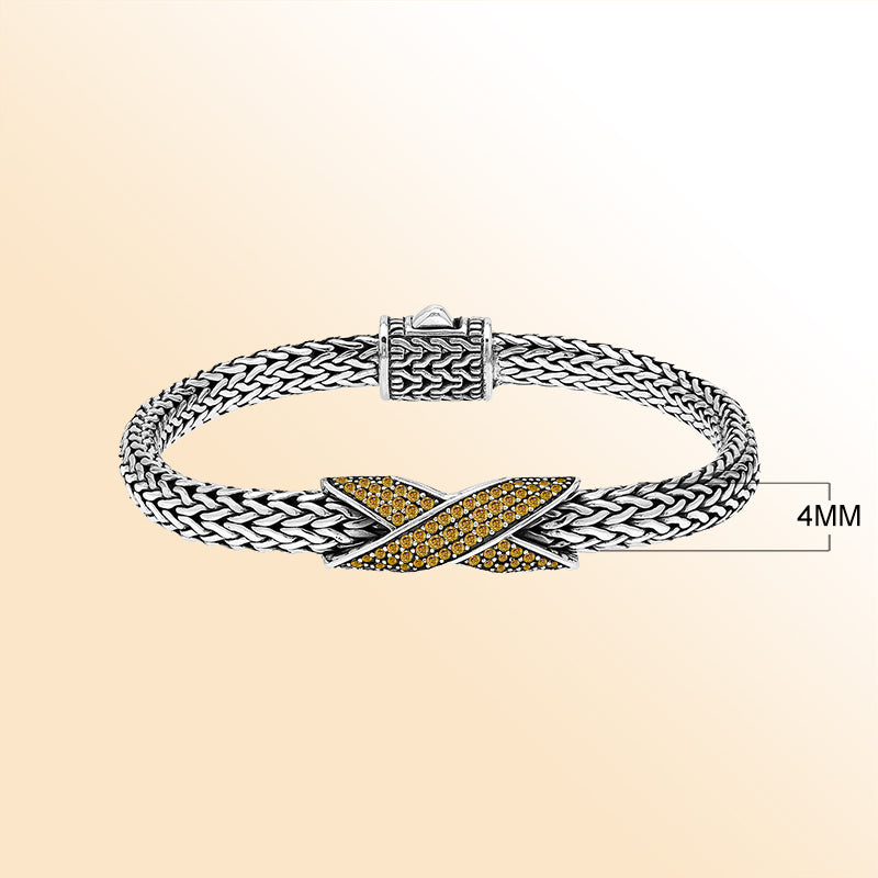  Handcrafted sterling silver woven bracelet featuring a radiant purple Citrine quartz crossover design from Bali.