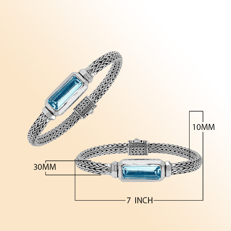 Sterling Silver woven bracelet showcasing a brilliant rectangular Blue Topaz Quartz motif with a polished finish, offering expressive shine, refined craftsmanship, and balanced artistic design.
