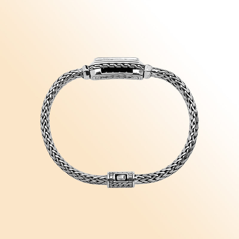 Sterling silver bracelet with green quartz baguette and handwoven Balinese chain handcrafted in Bali.