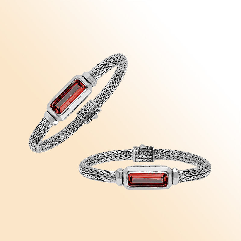 Handcrafted sterling silver bracelet featuring rectangular garnet quartz centerpiece on wheat chain design from Bali.