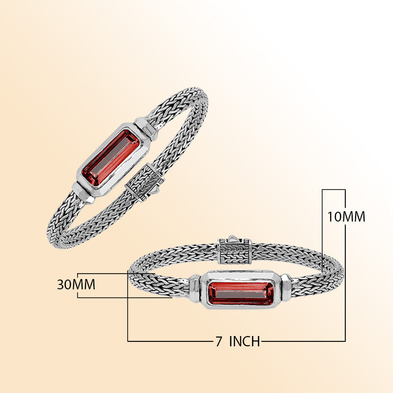 Handcrafted sterling silver bracelet featuring rectangular garnet quartz centerpiece on wheat chain design from Bali.