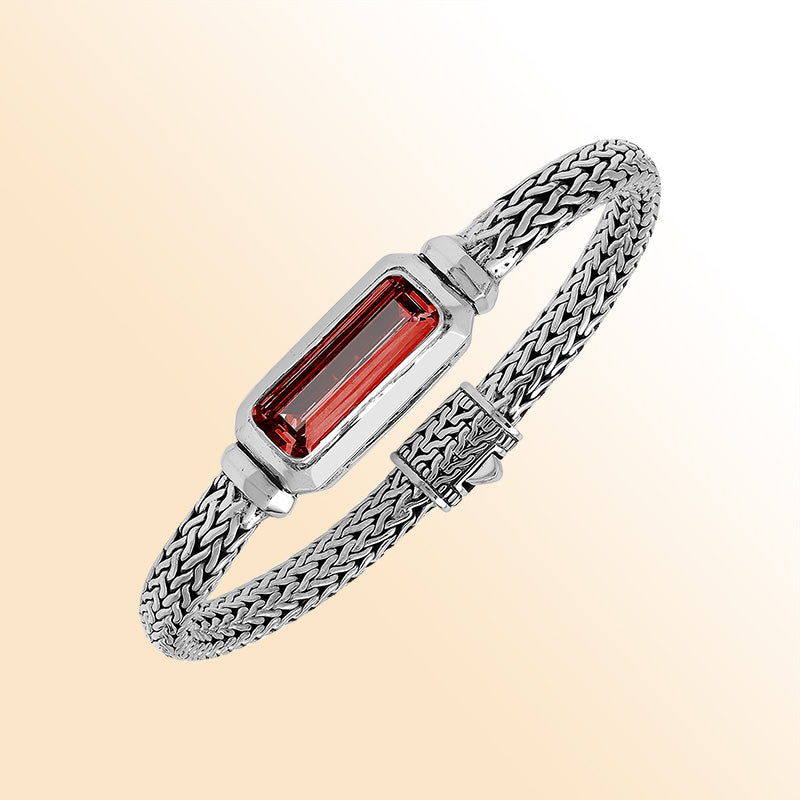 Handcrafted sterling silver bracelet featuring rectangular garnet quartz centerpiece on wheat chain design from Bali.