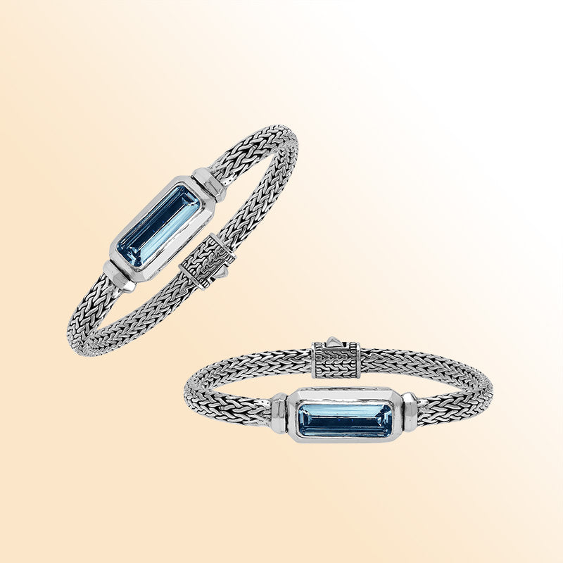 Sterling Silver woven bracelet showcasing a deep London Blue Topaz Quartz rectangular motif, polished to a bright mirror finish for an expressive accessory featuring detailed craftsmanship and color depth.