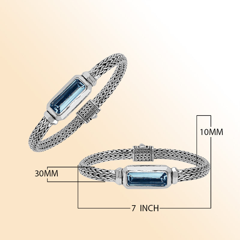 Sterling Silver woven bracelet showcasing a deep London Blue Topaz Quartz rectangular motif, polished to a bright mirror finish for an expressive accessory featuring detailed craftsmanship and color depth.