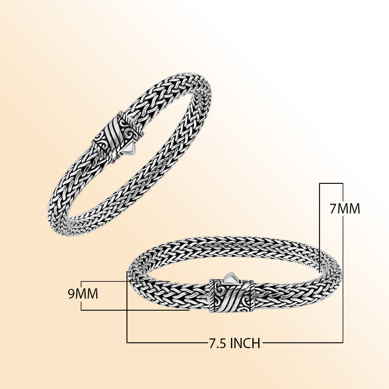 Sterling Silver thick woven bracelet with an artistic push lock, featuring polished detailing and handcrafted texture for an expressive, high-gloss accessory.