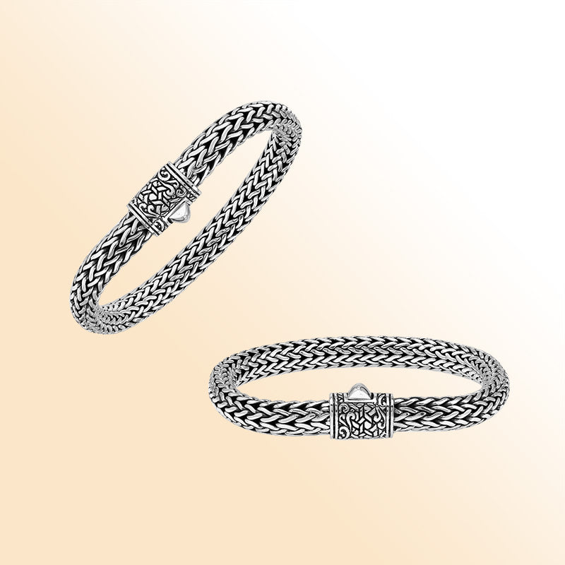 Sterling Silver thick woven bracelet featuring an intricate push lock and polished mirror finish, offering expressive handcrafted texture and elegant finishing details.