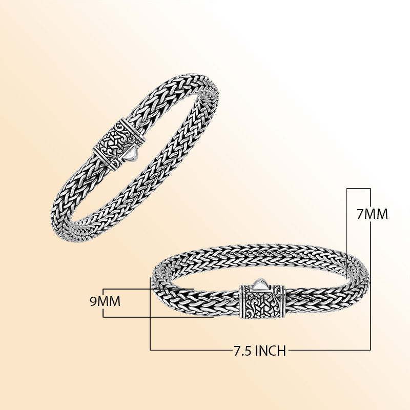 Sterling Silver thick woven bracelet featuring an intricate push lock and polished mirror finish, offering expressive handcrafted texture and elegant finishing details.