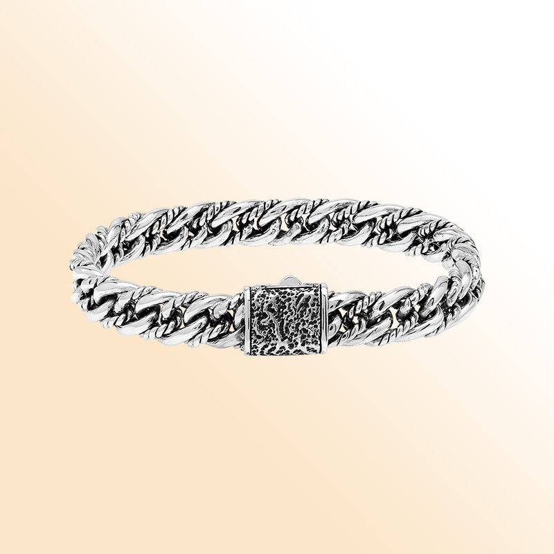 Handcrafted sterling silver woven chain bracelet with textured clasp, elegant unisex Bali jewelry design