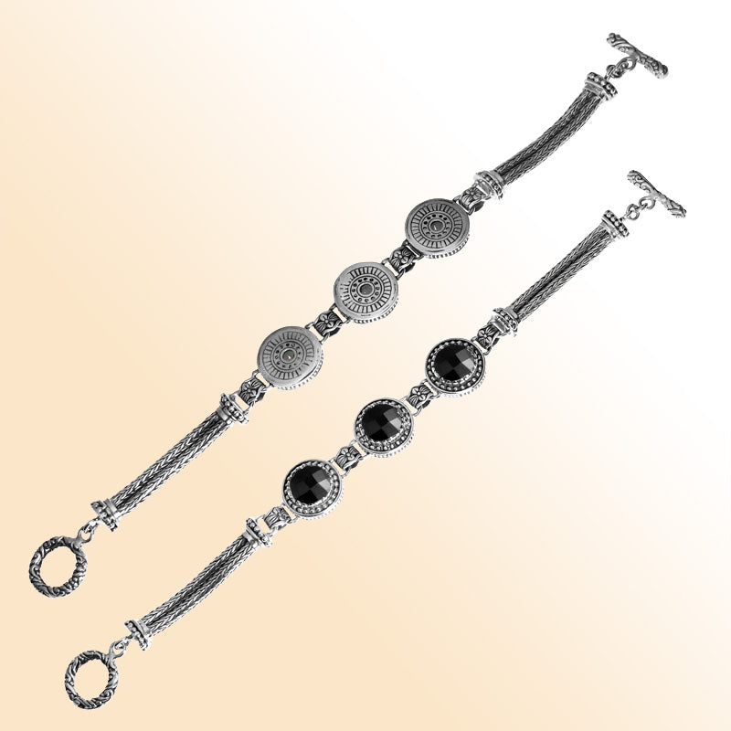 Elegant sterling silver bracelet featuring Black Onyx stones, ornate Balinese motifs, multi-strand chains, and a toggle clasp.