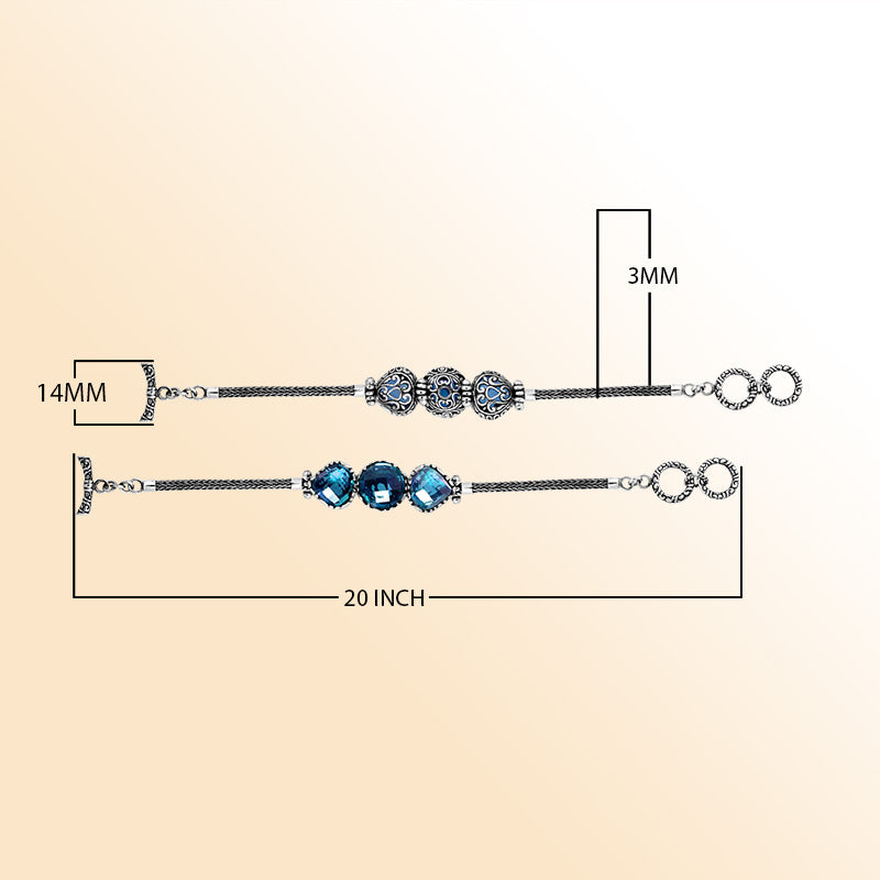 Retail sterling silver bracelet highlighting radiant Blue Topaz Quartz stones set in ornate Balinese frames with woven chain details and a toggle lock for elegant everyday wear.