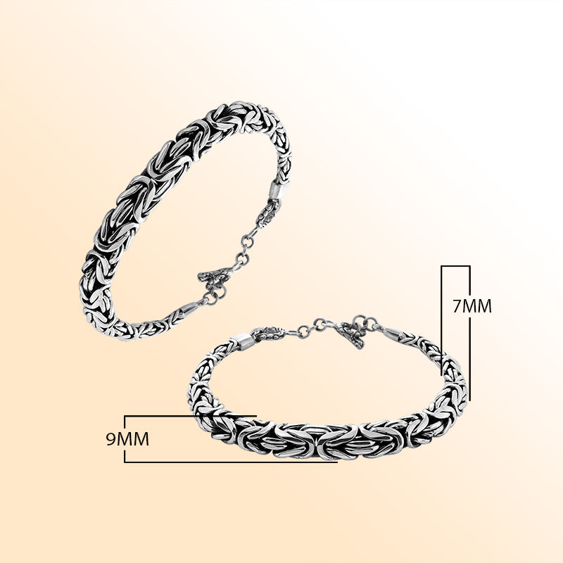Retail sterling silver bracelet featuring a bold 7MM x 9MM braided chain with polished highlights, oxidized details, and a secure toggle lock for elevated everyday styling.